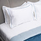 Brilliant White with Blue Embroidered Bedsheet