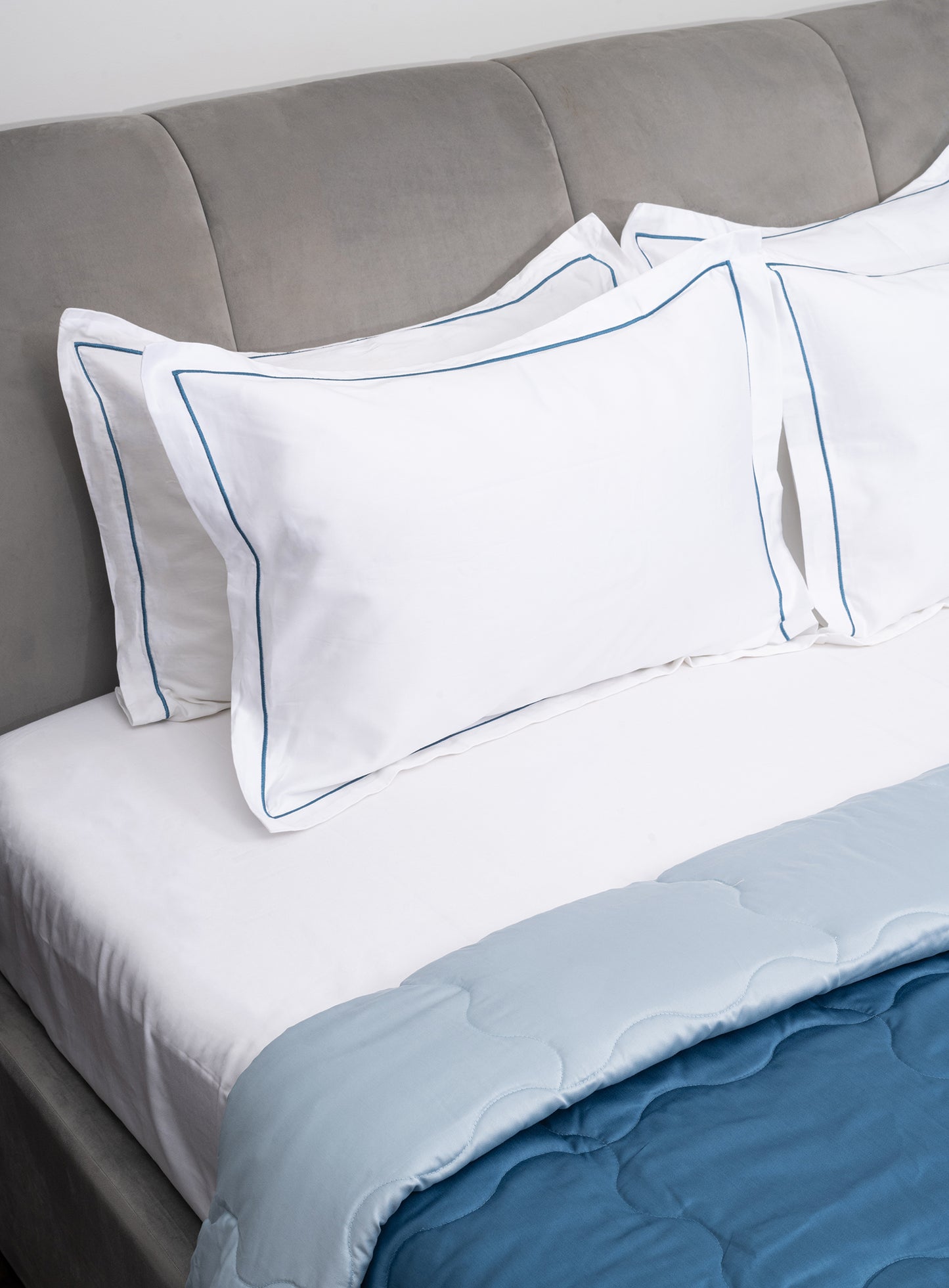 Brilliant White with Blue Embroidered Bedsheet